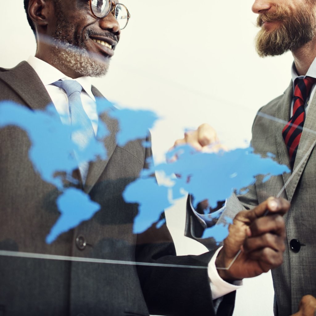 Businessmen World Map Glass Concept